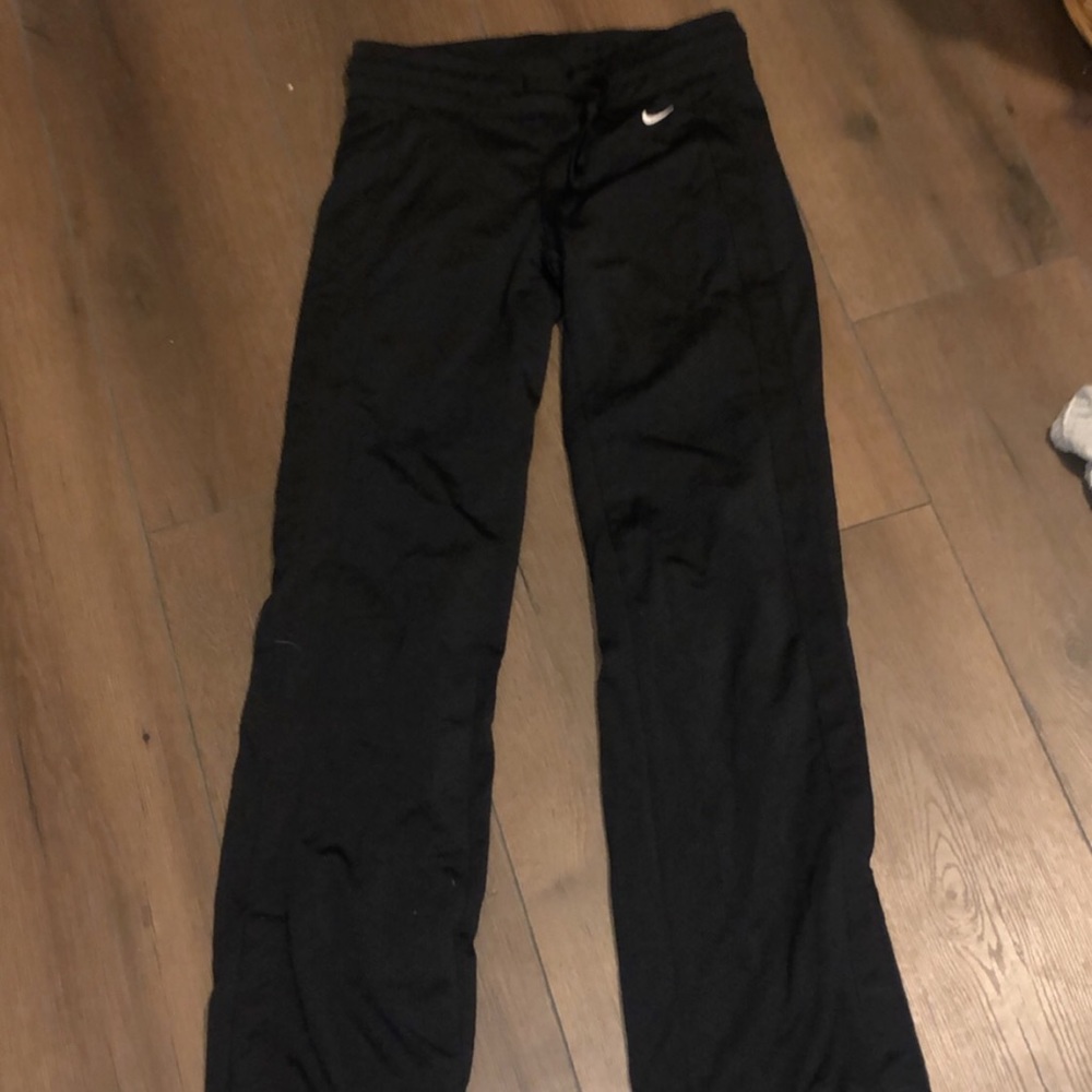 Nike pants with snaps